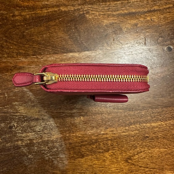 Authentic Prada Elegant Bow Wallet in dark pink/purple color. - Picture 16 of 16